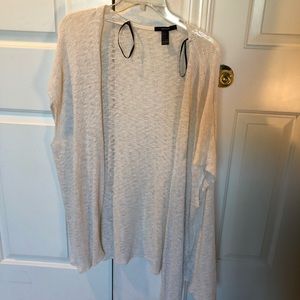 White sleeve-less cardigan